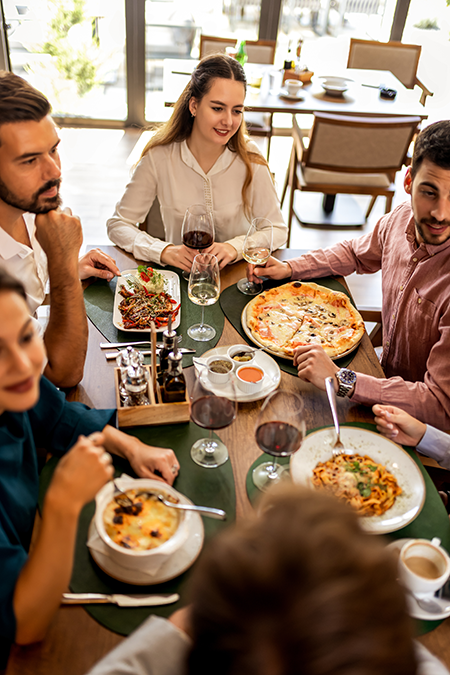 Friends enjoying dining experience